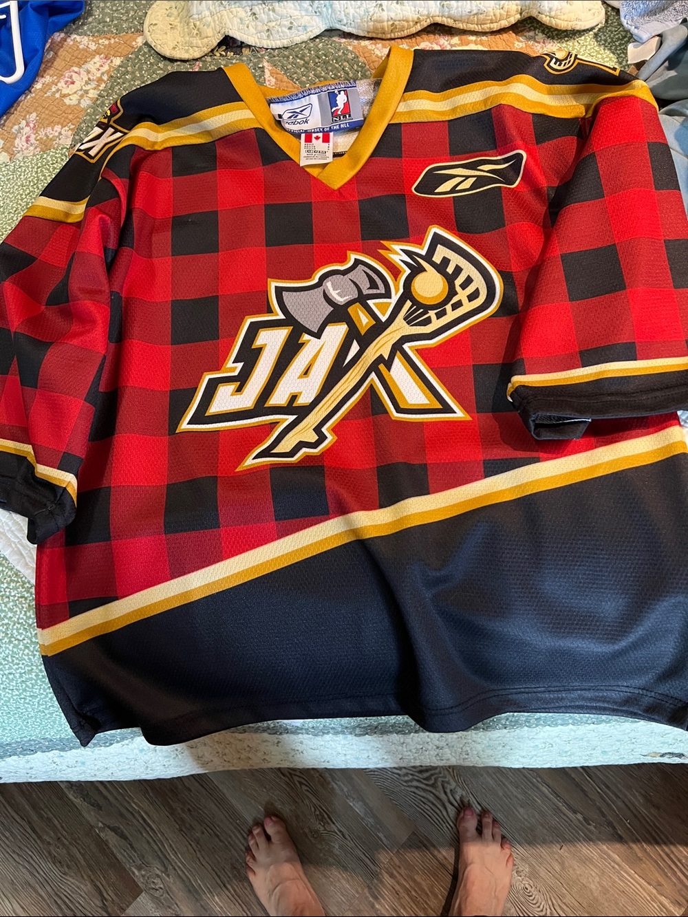 Reebok Red and Black Buffalo Plaid Hockey Jersey with Gold Trim